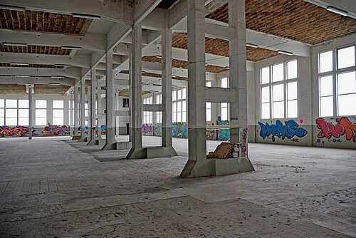 I capannoni industriali vuoti del sito di Attisholz saranno presto convertiti in appartamenti e spazi commerciali.