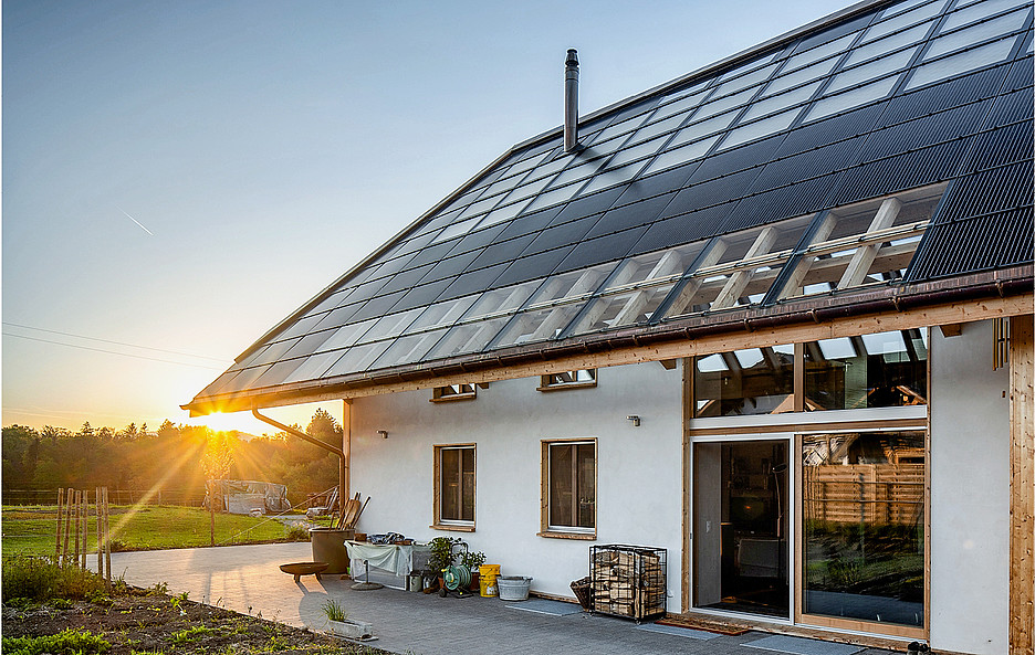 Une maison individuelle construite à partir de bottes de paille, à Graben (BE).